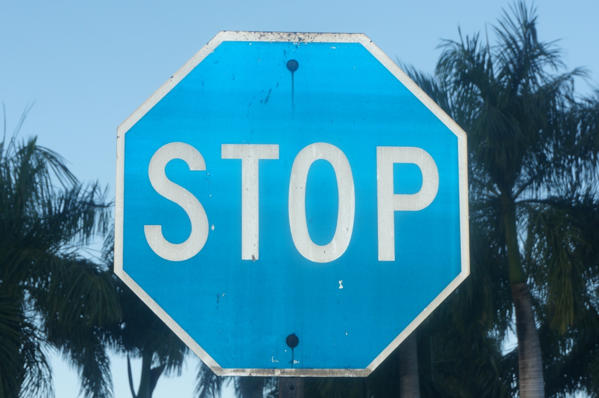 Non-compliant blue STOP sign